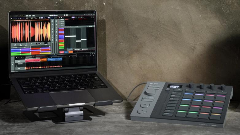 Close-up of Serato SLAB, a Studio-native MIDI pad controller showing velocity-sensitive RGB pads.